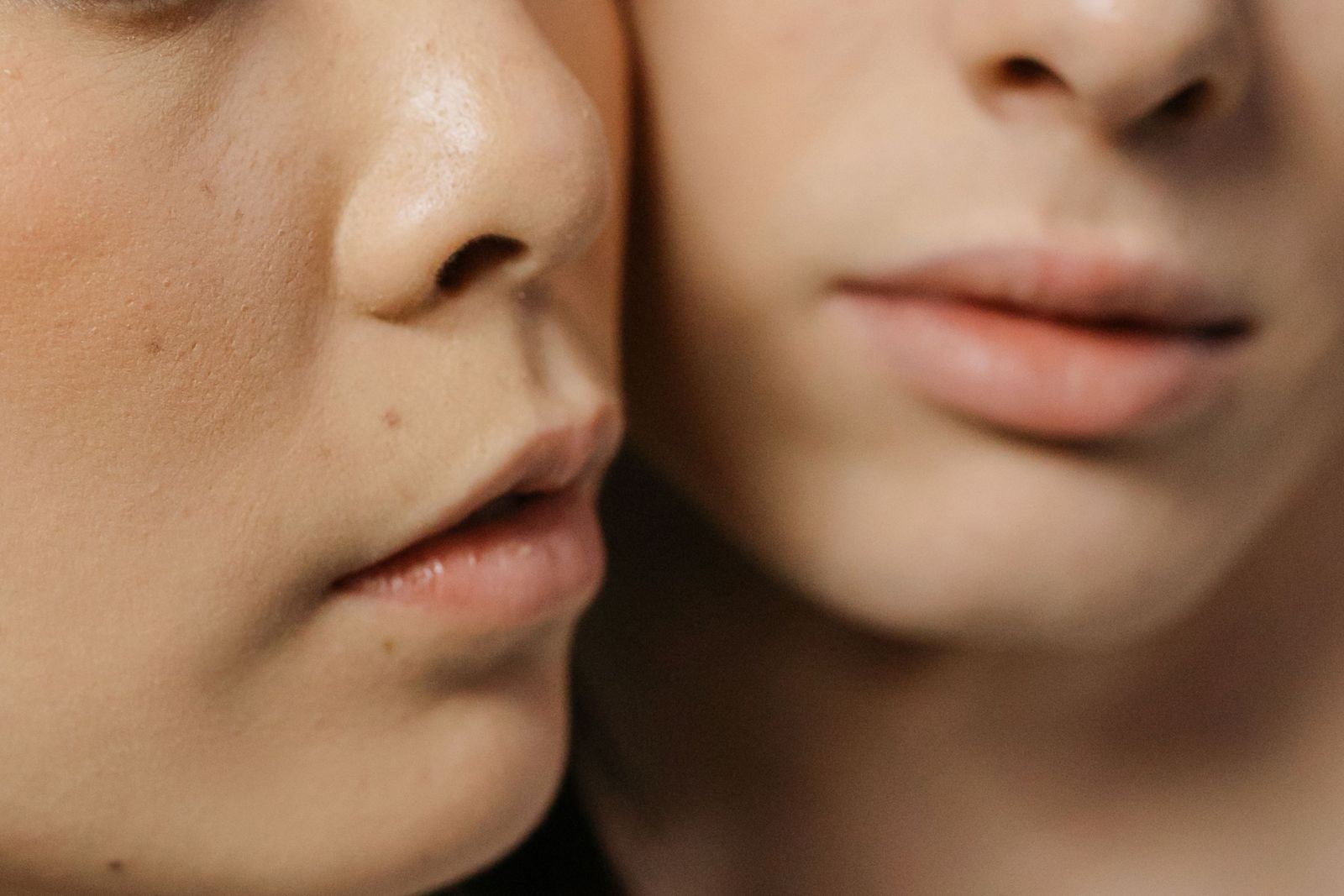 Close-up of clear, even-toned skin across the cheeks